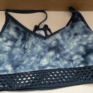 Pink Victoria’s Secret sports bra in good condition size large